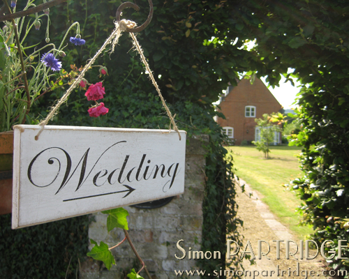Wedding this way -m vintage direction sign